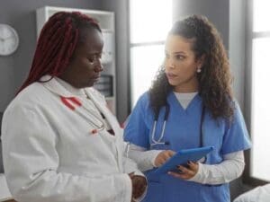Nurse and doctor conferring